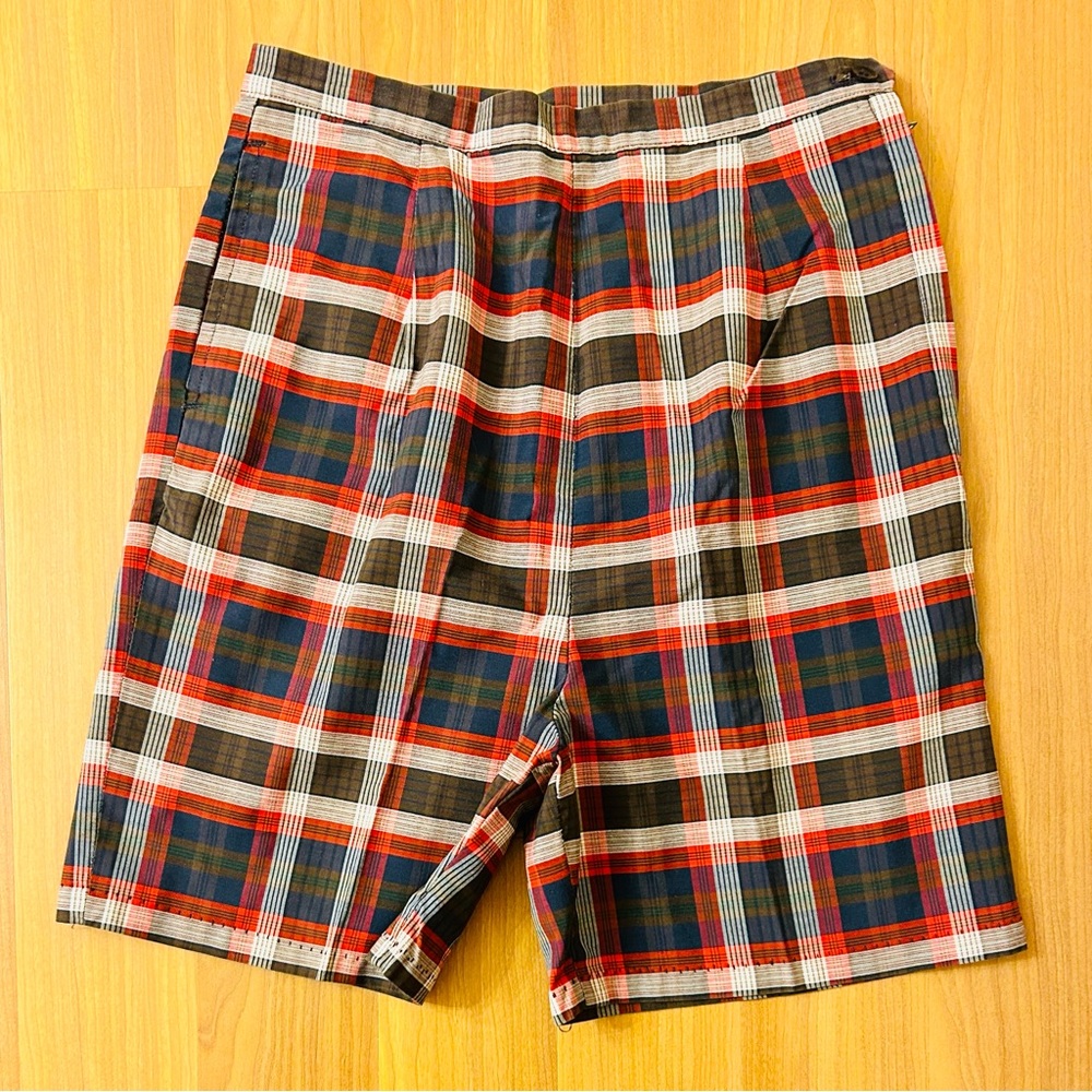 Vintage 60s high-rise fitted plaid shorts in brown, red, white, and navy blue